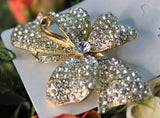 Gold bow crystal brooch